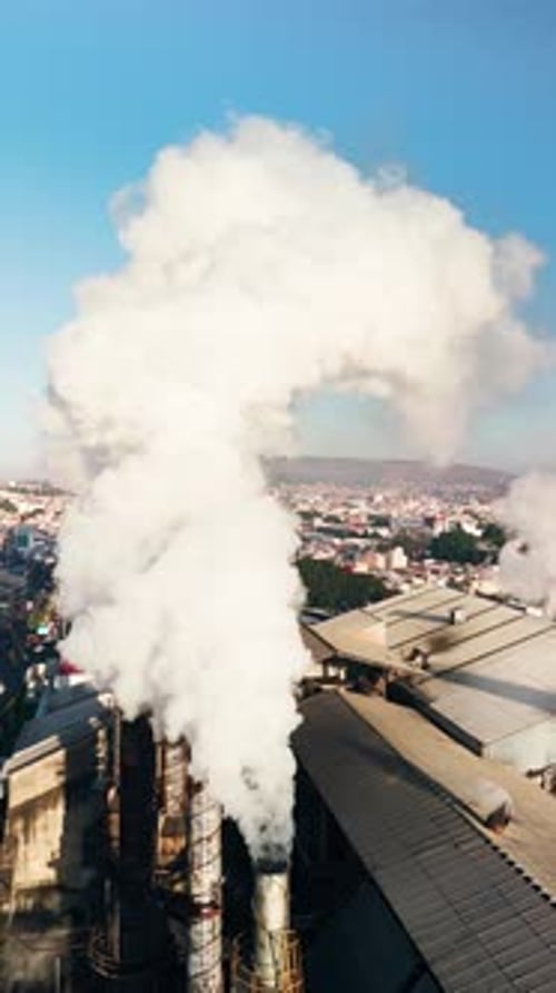 Toxic Smoke Cloud Coming Out Of The Pipes Of Industrial Plant