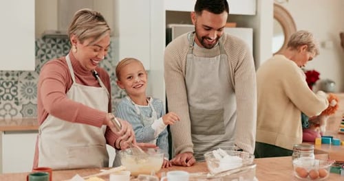 Family Enjoys Baking in Kitchen Together
