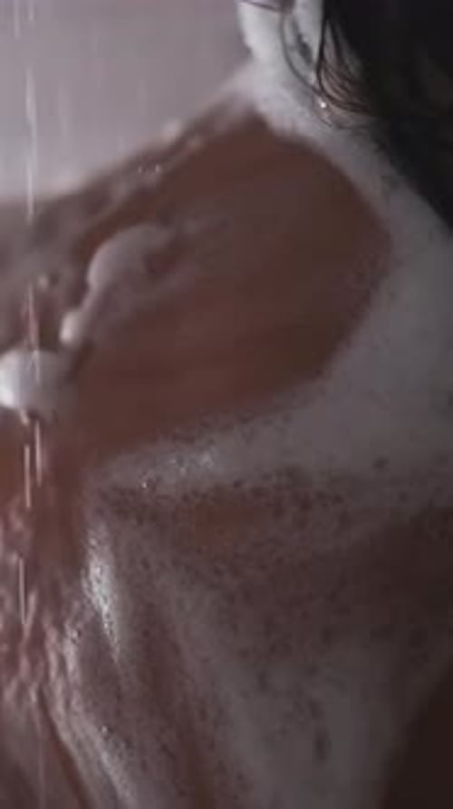 Woman with Soap Bathing in Shower Under Water