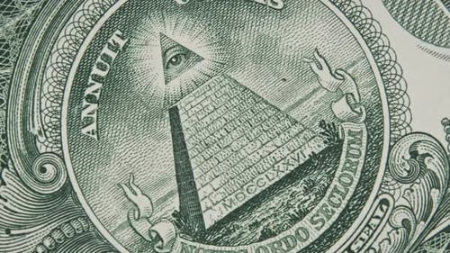 The AllSeeing Eye Sign Rotates on a One Dollar Bill CloseUp