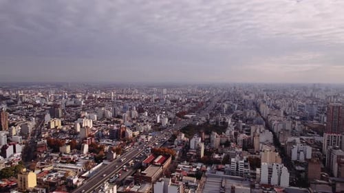 Aerial View of City with Highway Traffic