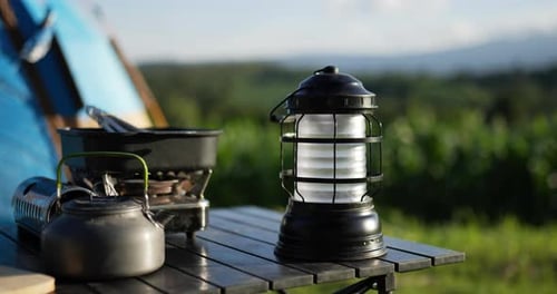 Camping Equipment in the Mountains on a Table