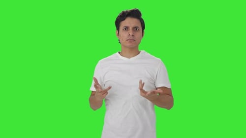 Indian man asking what question Green screen