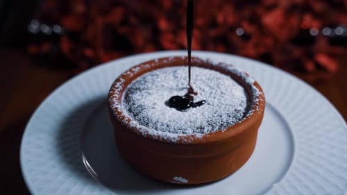 Hot Chocolate souffle. souffle presentation chocolate dessert fiery.