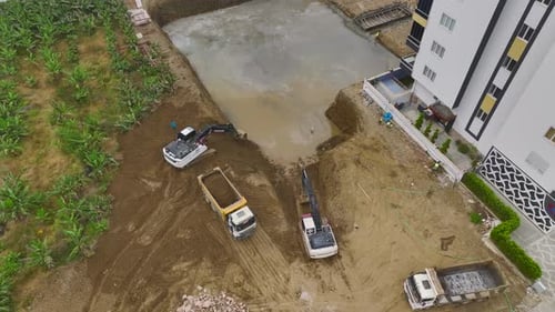 Aerial View Laying the Base Concrete and Heavy Machinery Operations