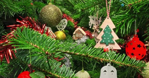 Christmas tree view from inside. Green Christmas tree with ornaments.