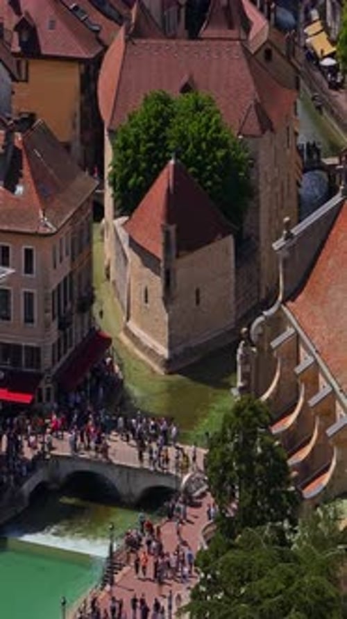 Old Town Center of Annecy and the River Thiou with Tourists Visiting An Emblematic River of Annecy
