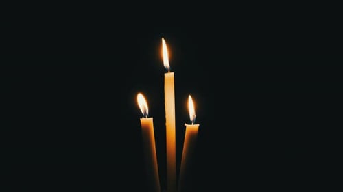 Three Candles Burning in the Darkness