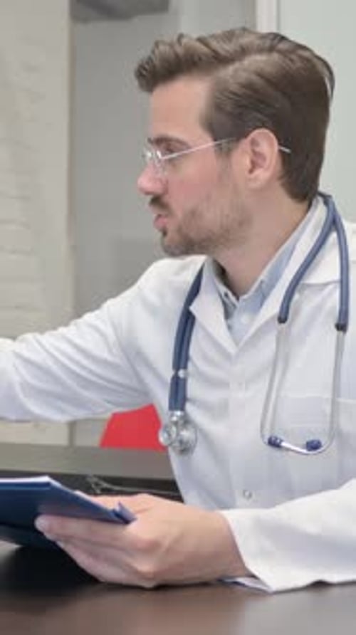 Doctor Consolidating Srtressed Female Patient in Hospital, vertical video