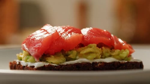Delicious Croissant Sandwich Made with Egg and Avocado and Salmon Traditional French Cuisine France