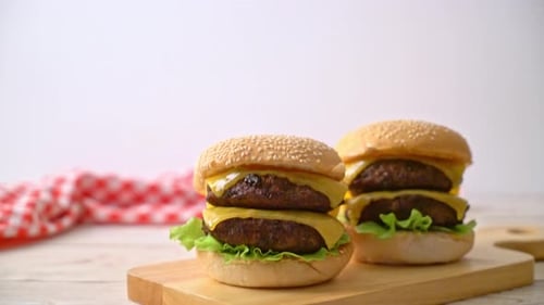 Double Cheeseburgers with Lettuce and Melted Cheese