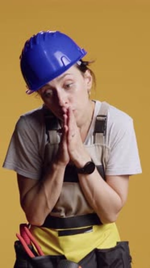 Vertical Video Portrait of Female Contractor Praying to Ask for Fortune