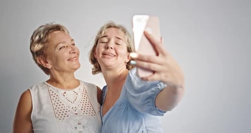Two Women Taking Selfie, Affectionate Moment