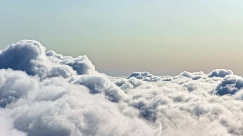 Majestic aerial view of a sea of fluffy white clouds from above