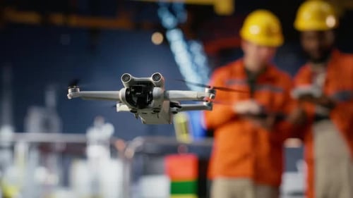 Professional Drone Operators Flies a UAV Around a Drilling Rig