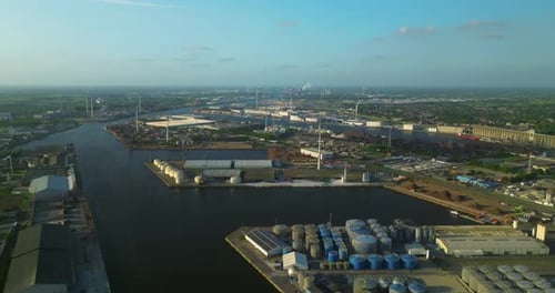 Aerial View From a Drone of a Cargo Canal Ship Passes By Over the Canal on a Sunny Day Reflections