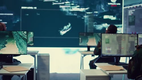 Futuristic Operations Center With People Monitoring Data