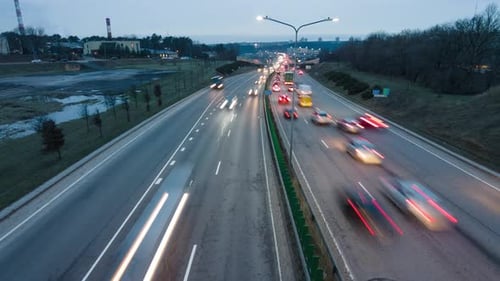Evening traffic on the bypass road, tilt time-lapse