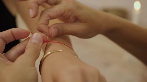 Red Thread Hand