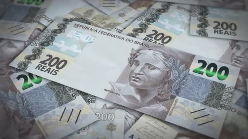 Pile of brazil real cash money, inflation concept. Closeup new brazil two hundred real bills