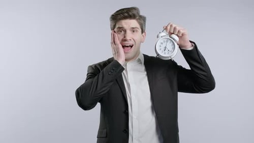 Anxious Businessman with Classical Clock in Hands Nervous Man in Panicdeadline