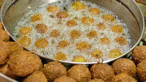 Fresh Falafel Balls Frying in Oil