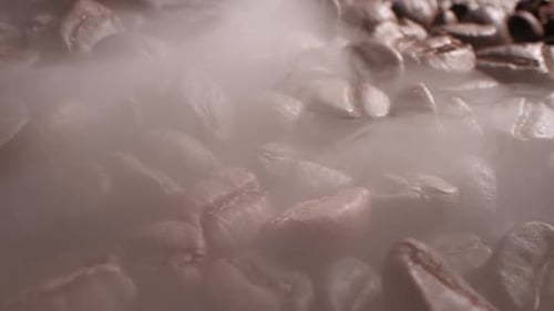 Steaming Roasted Coffee Beans in a Close Up Shot