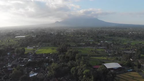 Lush Green Countryside with Mountain Aerial View