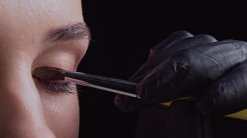 Eye Makeup Application with Brush on Young Adult