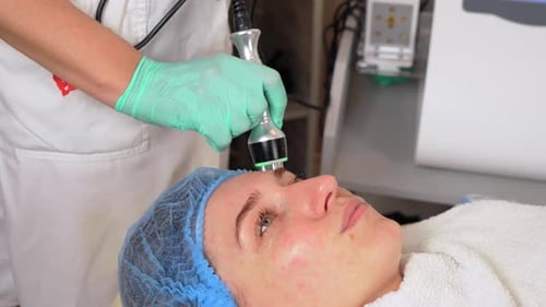 Fractional Lifting and Cavitation of Face Procedure in Beauty Clinic Hardware Cosmetology Close Up
