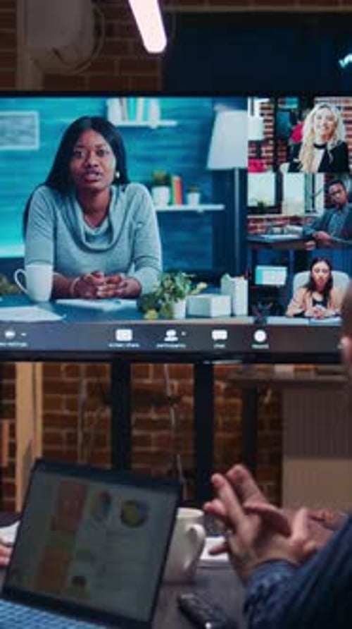 Online Meeting on Large Screen in Office