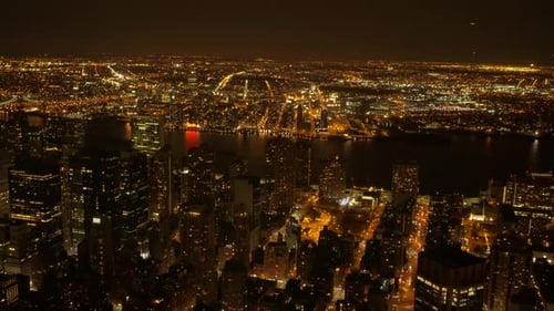 aerial view of big metropolis city at night. illuminated streets and buildings