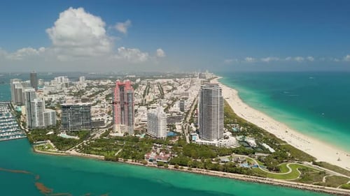Miami Beach Skyline Cityscape Architecture of Miami Bayside with Bright Blue Sea Aerial Wide View