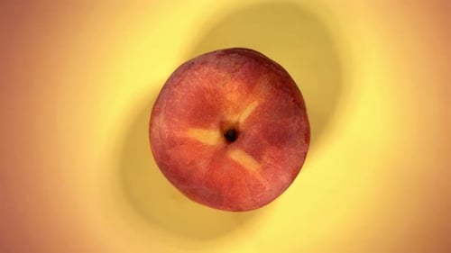 Super Slow Motion of Explosion Peach and Burst Juice