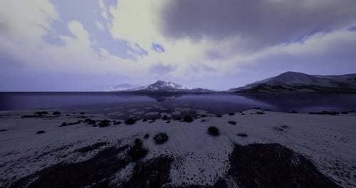 Winter Snowy Mountain Landscape with Calm Lake View