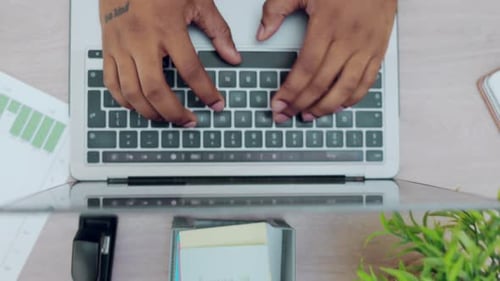 Laptop, hands typing and top view for analytics in office, writing email or digital marketing