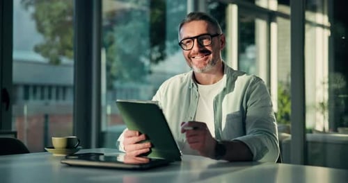 Business, tablet and man in office, face and research for article, internet or feedback