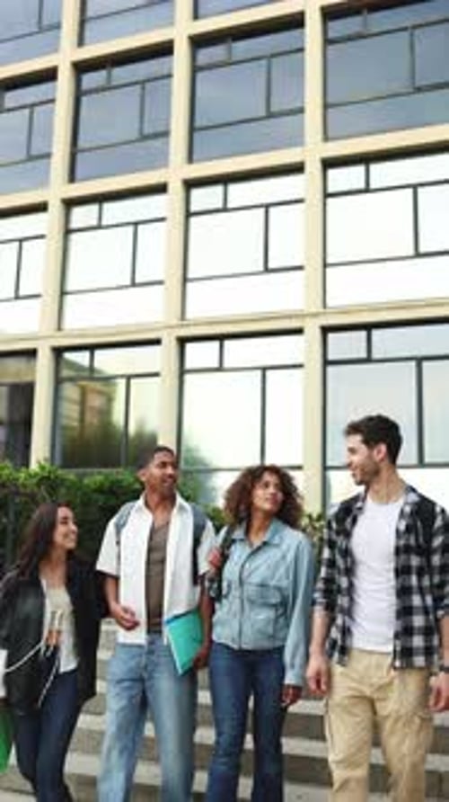 Diverse students walking and talking outside a modern campus building, showcasing friendship