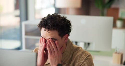 Man, glasses and computer in office with eye strain, headache and article submission pressure