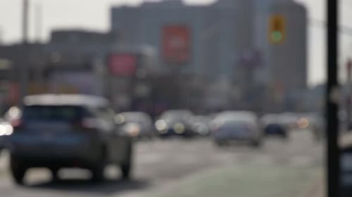 car passing intersection traffic light