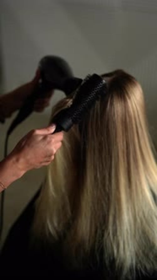 Blonde Hair Styling With Brush and Dryer