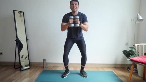 Asian Man Doing Workout At Home