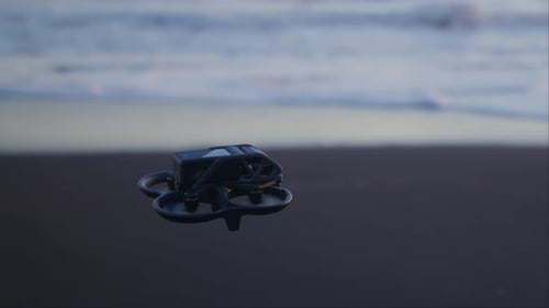 A Drone Flies Low Along The Coast Of Reynisfjara Beach