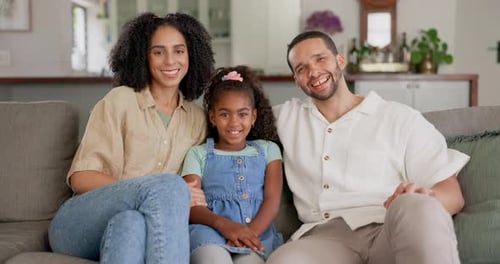 Happy, smile and face of family on sofa for relax, bonding and lounge together