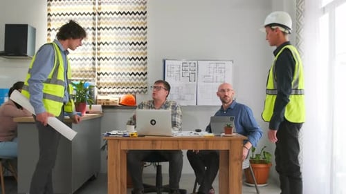 Design Team Meeting in Modern Office