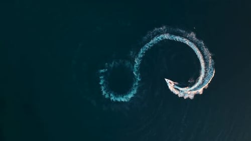 Boat Creates Swirls on the Water From Above