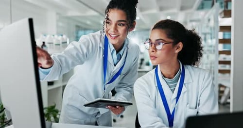 Women, scientist and happy on computer at lab for science research and investigation