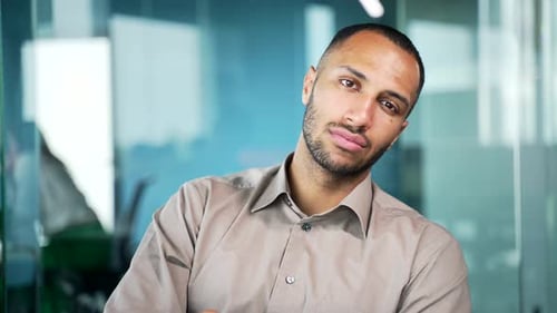 View webcam. Business man employee, entrepreneur listens a video course webinar or seminar, looking