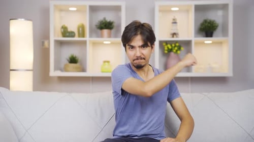 Man getting angry at camera.