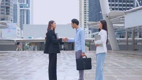 Business People Meet in Urban Environment